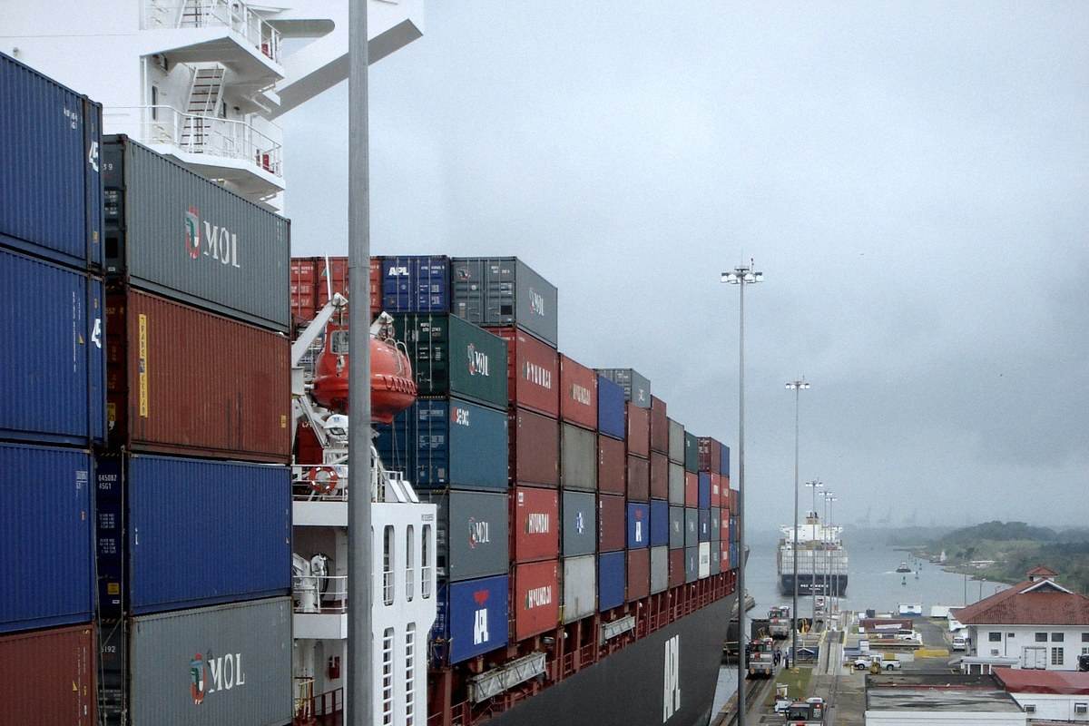 Shipping containers stacked beside the Panama Canal